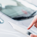 car-salesman-with-tablet-2